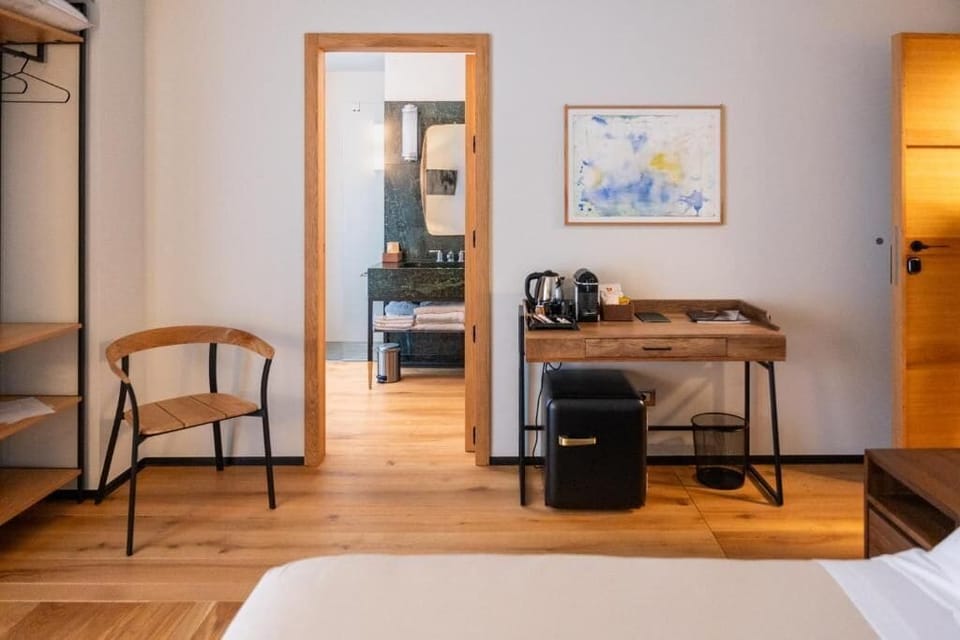 Deluxe Double Room, 1 Queen Bed, Balcony, City View | In-room safe, desk, laptop workspace, blackout drapes