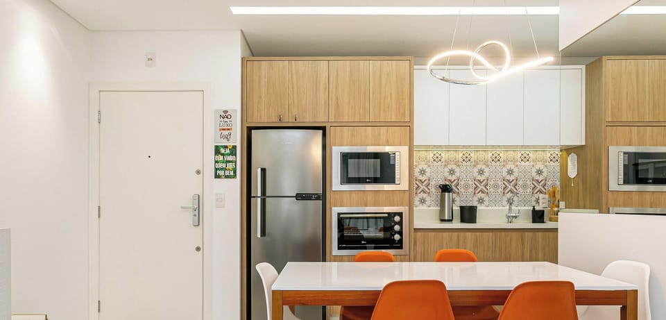 Premium Apartment, Pool Access, City View | Private kitchen | Fridge, microwave, cookware/dishes/utensils, dining tables