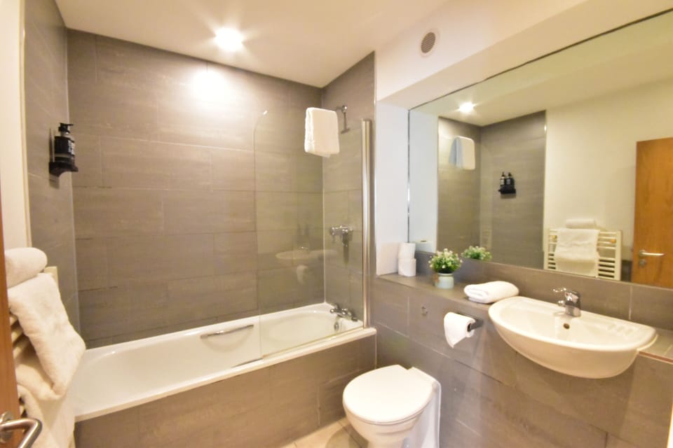 Shower, eco-friendly toiletries, hair dryer, towels