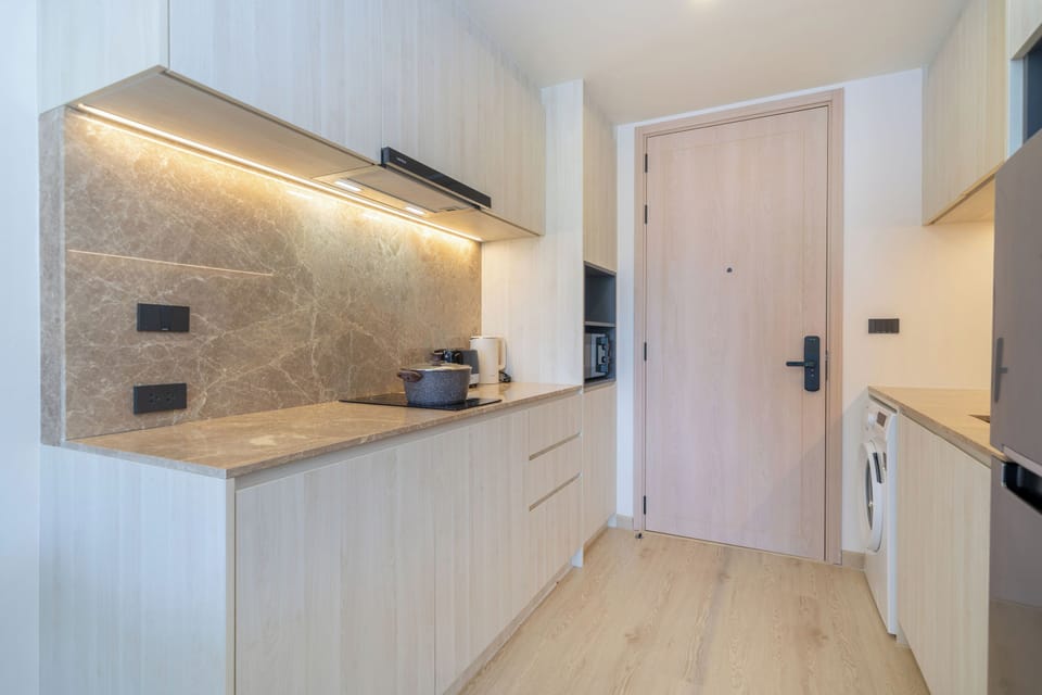 Condo, Balcony, Pool View | Private kitchen | Microwave, stovetop, coffee/tea maker, electric kettle