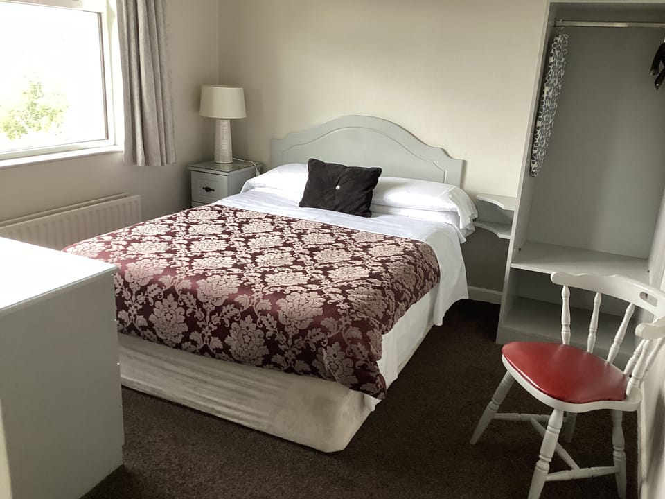 Standard Double Room, Garden View | Blackout drapes, iron/ironing board, free WiFi