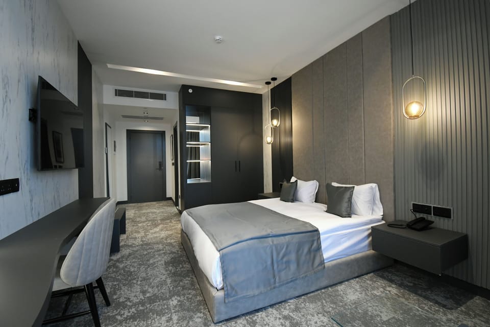 Standard Double Room, City View | Desk, free WiFi, bed sheets
