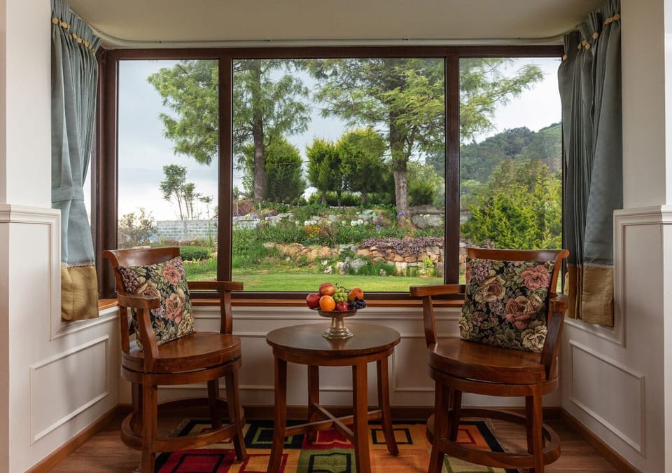 Magnolia Coonoor | Minibar, in-room safe, iron/ironing board, free WiFi