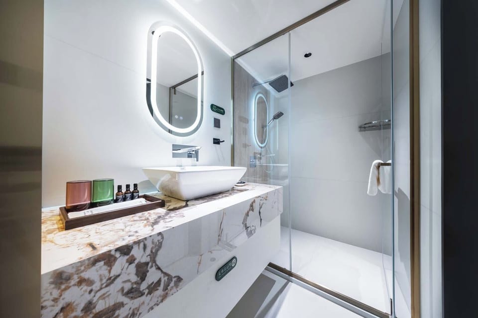 Family Duplex, City View | Bathroom | Designer toiletries, hair dryer, slippers, towels