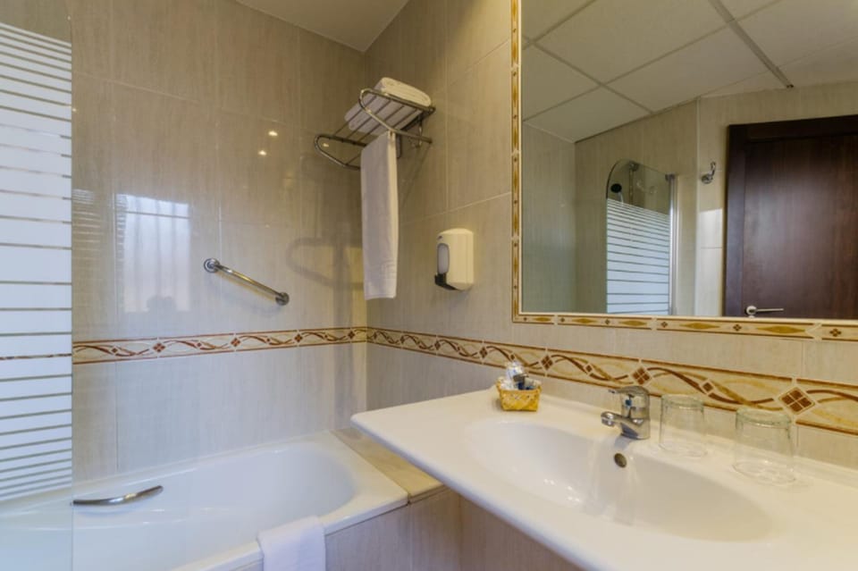 Deep soaking tub, free toiletries, hair dryer, bidet