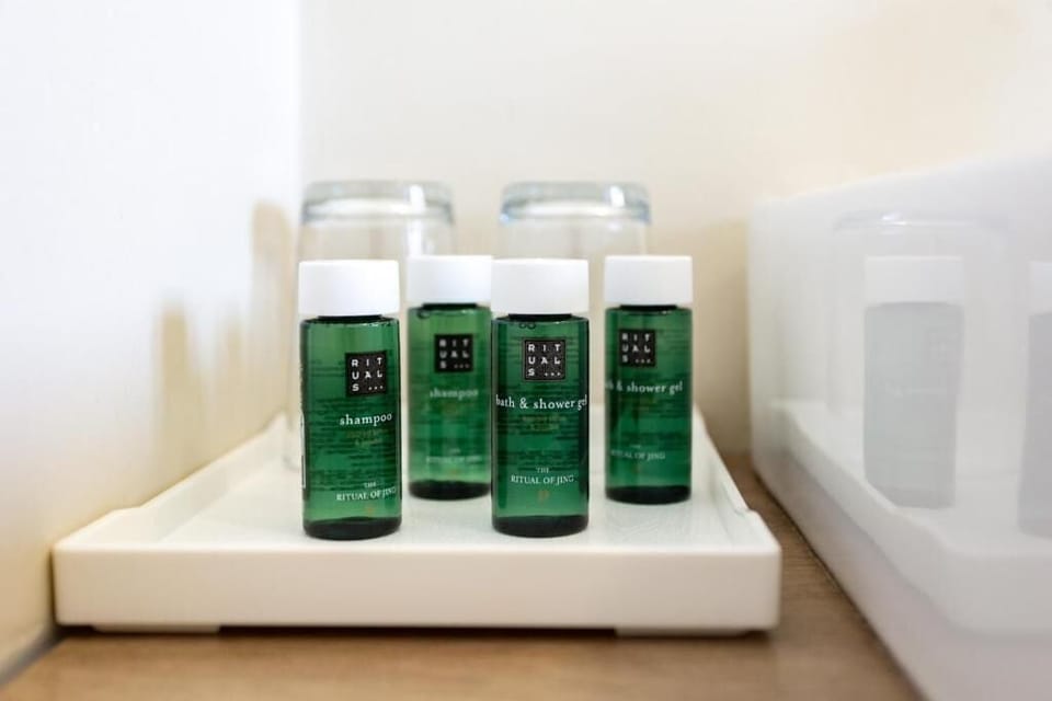 Suite, Pool View | Bathroom amenities | Hair dryer, towels, shampoo, toilet paper