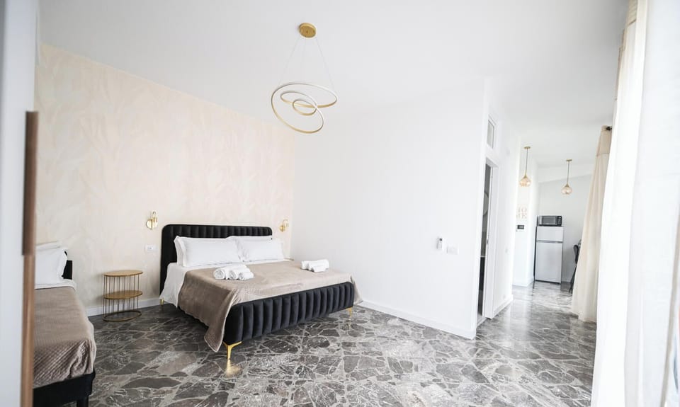 Deluxe Apartment, City View | Desk, laptop workspace, iron/ironing board, free WiFi