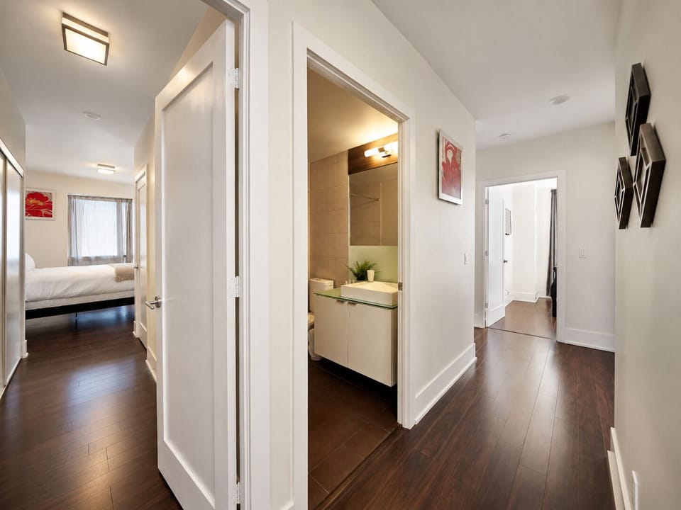 Elite Suite, 2 Bedrooms | Living area | 50-inch flat-screen TV with digital channels