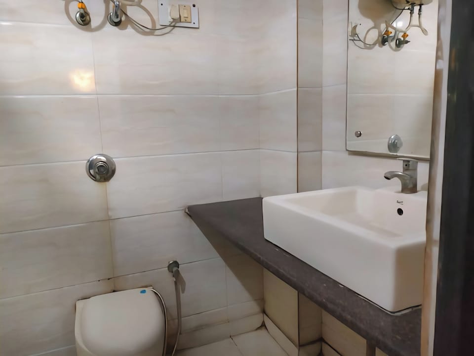 Shower, towels, soap, toilet paper