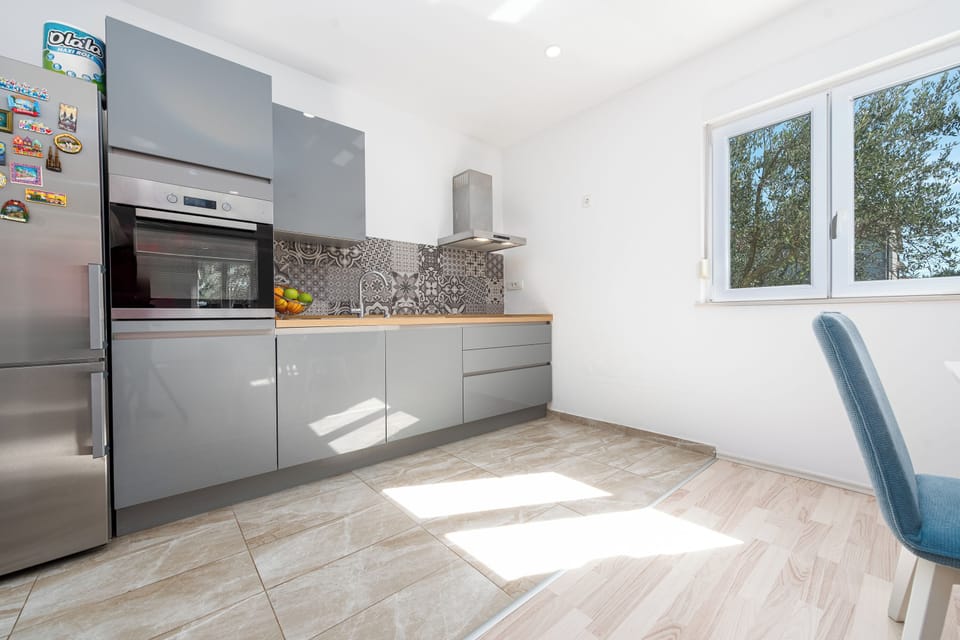 Family House, Multiple Bedrooms, 2 Bathrooms (Pool House Olive) | Private kitchen | Fridge, microwave, oven, stovetop