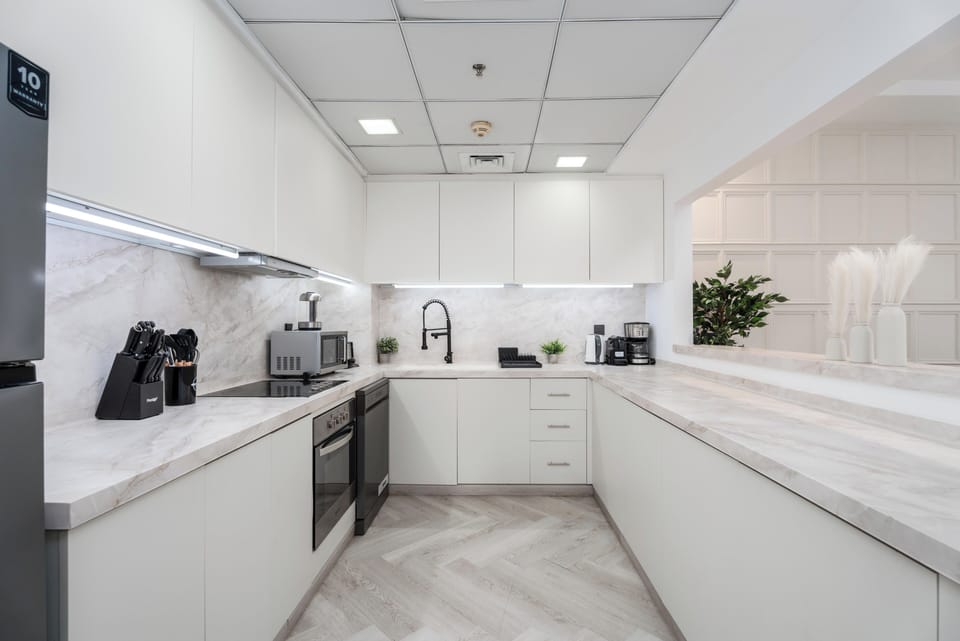 Signature Apartment, 4 Bedrooms, Kitchen, Beach View | Private kitchen | Coffee/tea maker, electric kettle, toaster