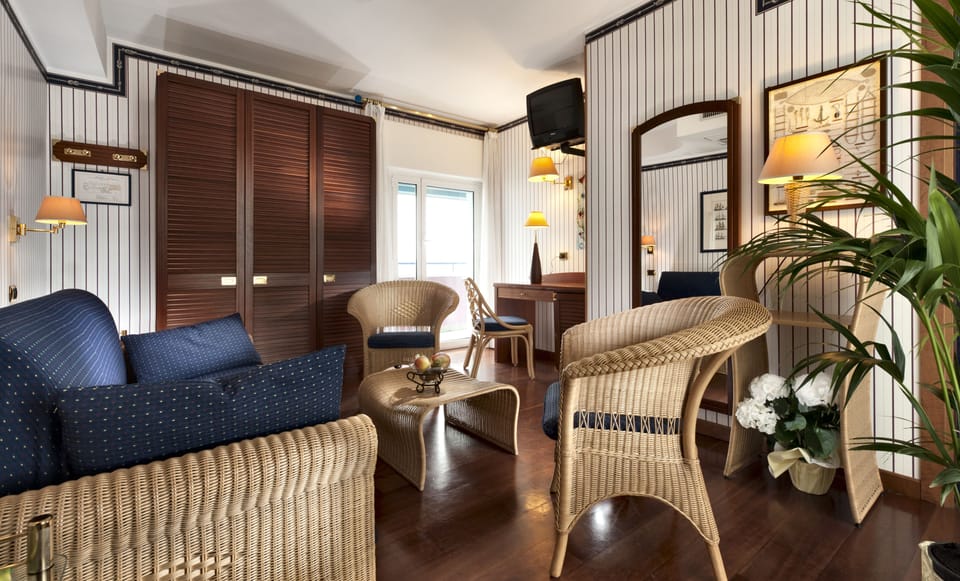 Deluxe Suite, Terrace, Sea View | Living area | LED TV