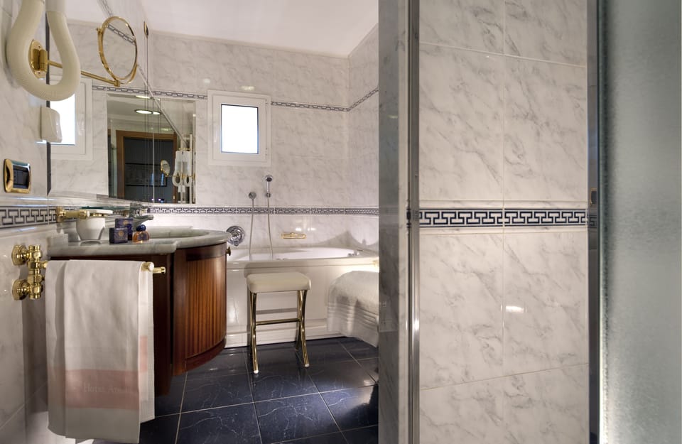 Deluxe Suite, Terrace, Sea View | Bathroom | Shower, free toiletries, hair dryer, bidet