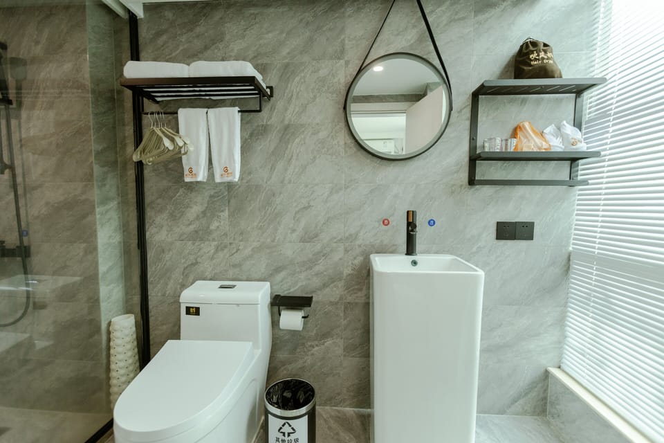 Basic Single Room | Bathroom | Free toiletries, hair dryer, slippers, towels