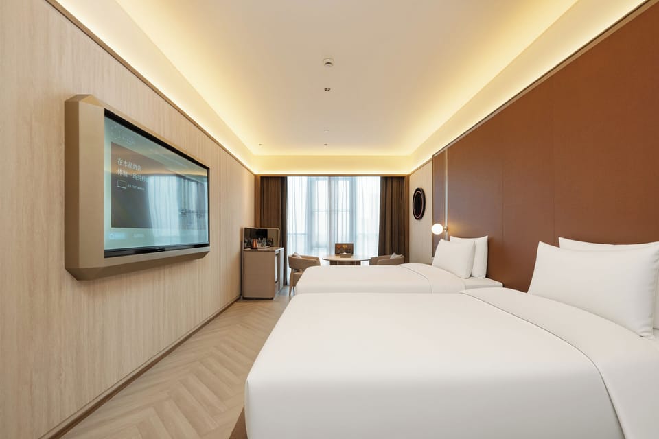 Superior Twin Room | Down comforters, memory foam beds, free minibar, laptop workspace
