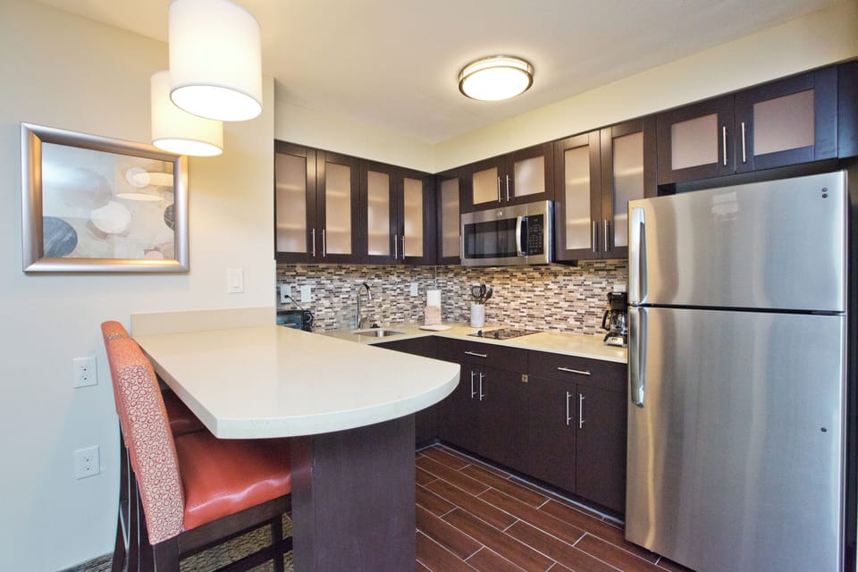 Suite, 1 Bedroom, Kitchen | Desk, laptop workspace, blackout drapes, iron/ironing board