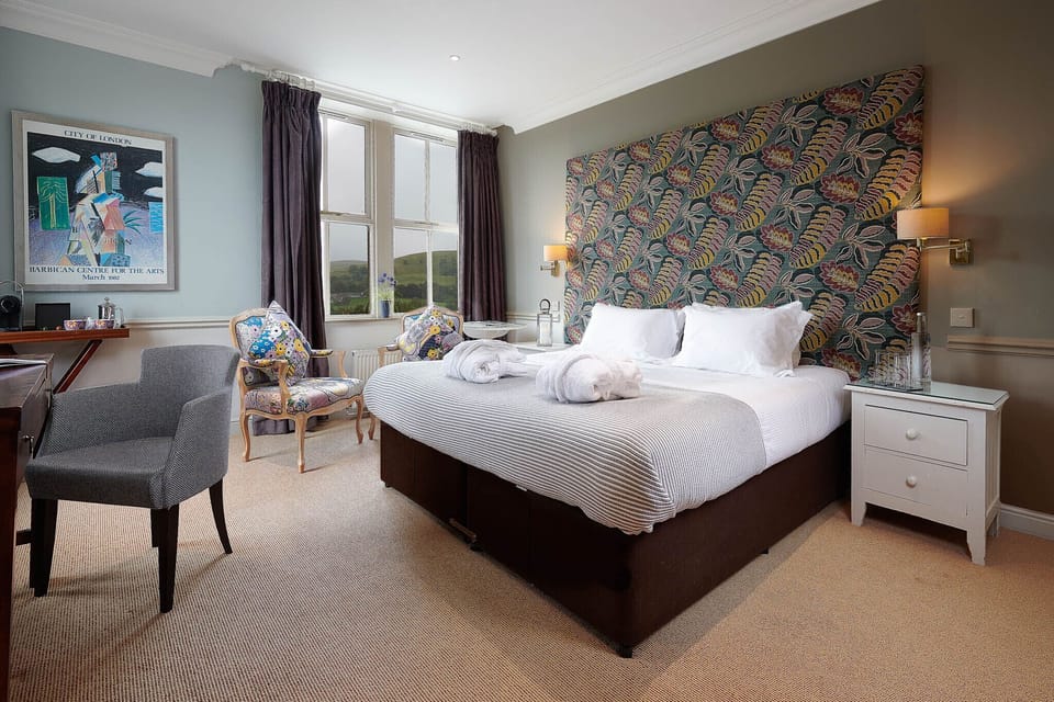 Luxury Suite | Premium bedding, in-room safe, desk, iron/ironing board