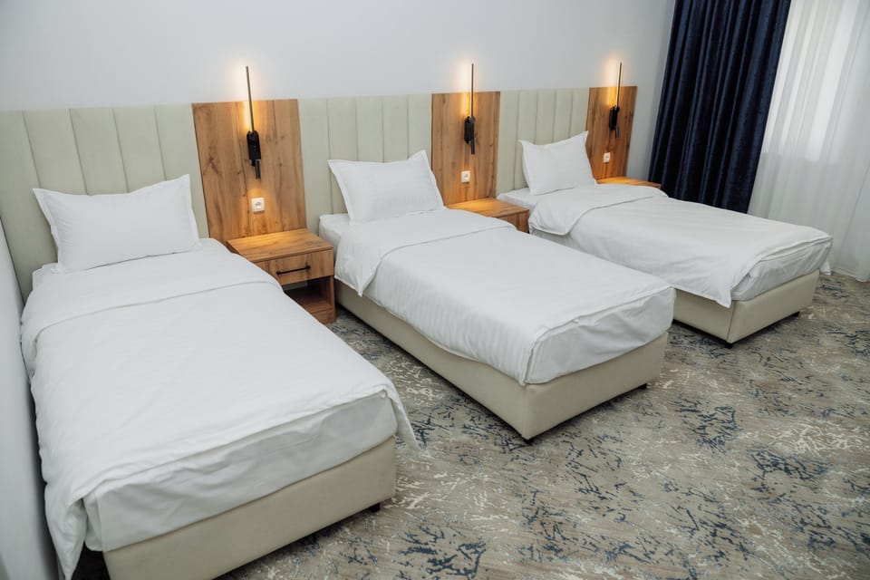 Triple Room | Premium bedding, desk, laptop workspace, blackout drapes