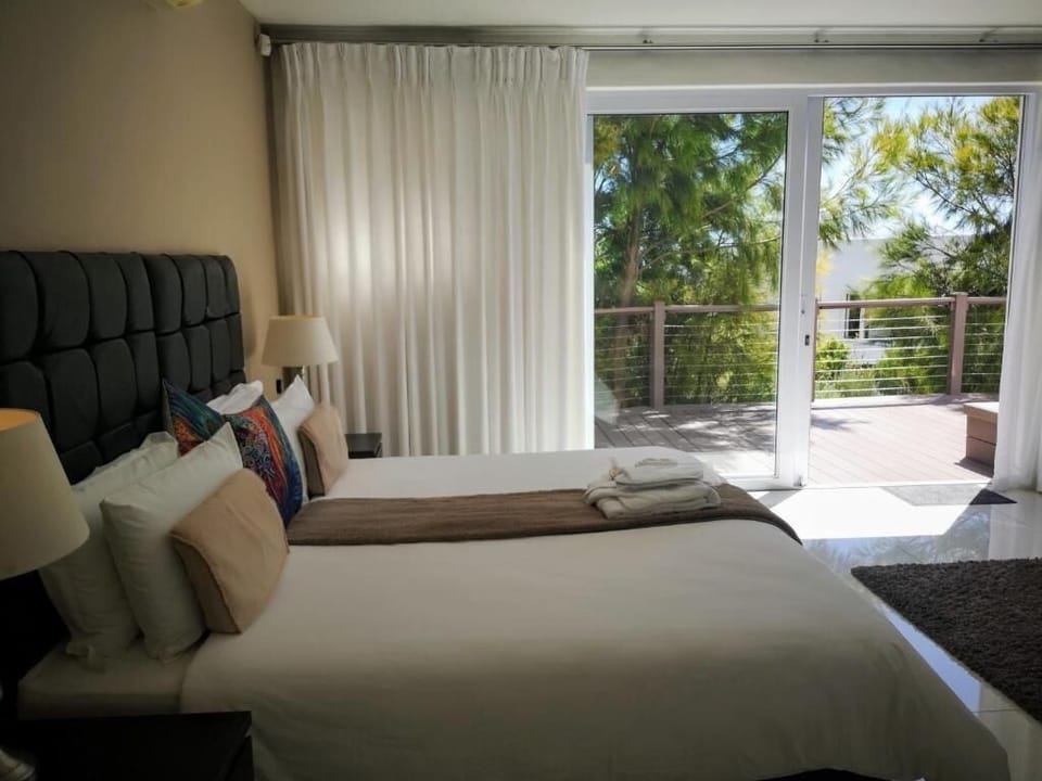 Executive Suite, Patio, Garden View | In-room safe, soundproofing, iron/ironing board, free WiFi