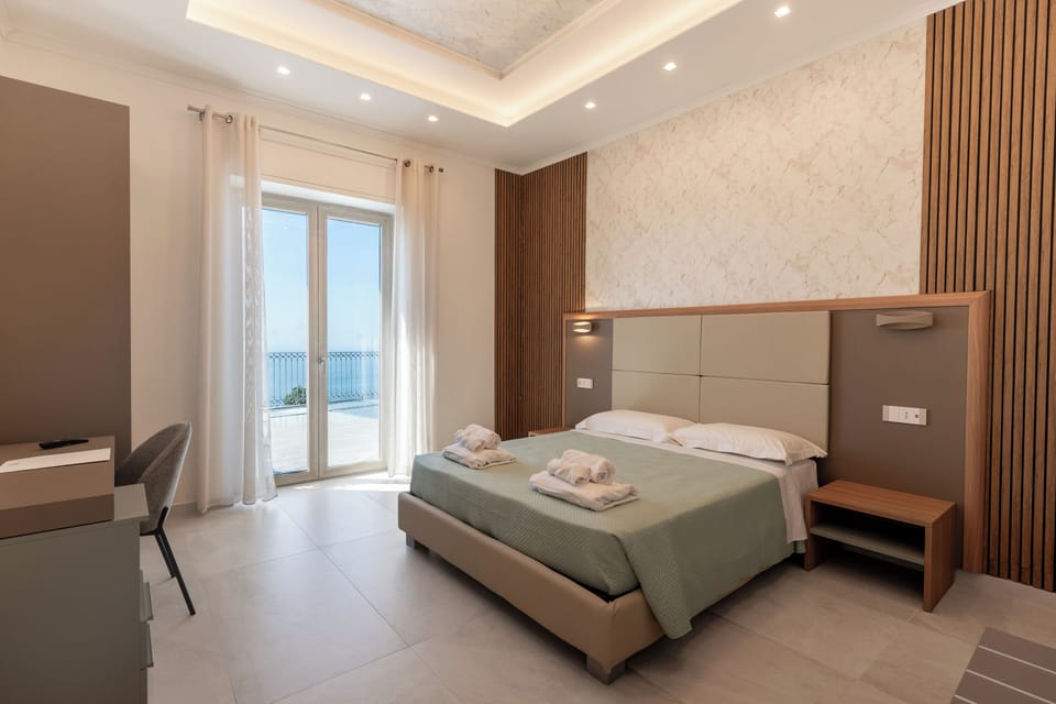 Room, Sea View (Sagittarius) | Minibar, desk, WiFi (free), bed sheets