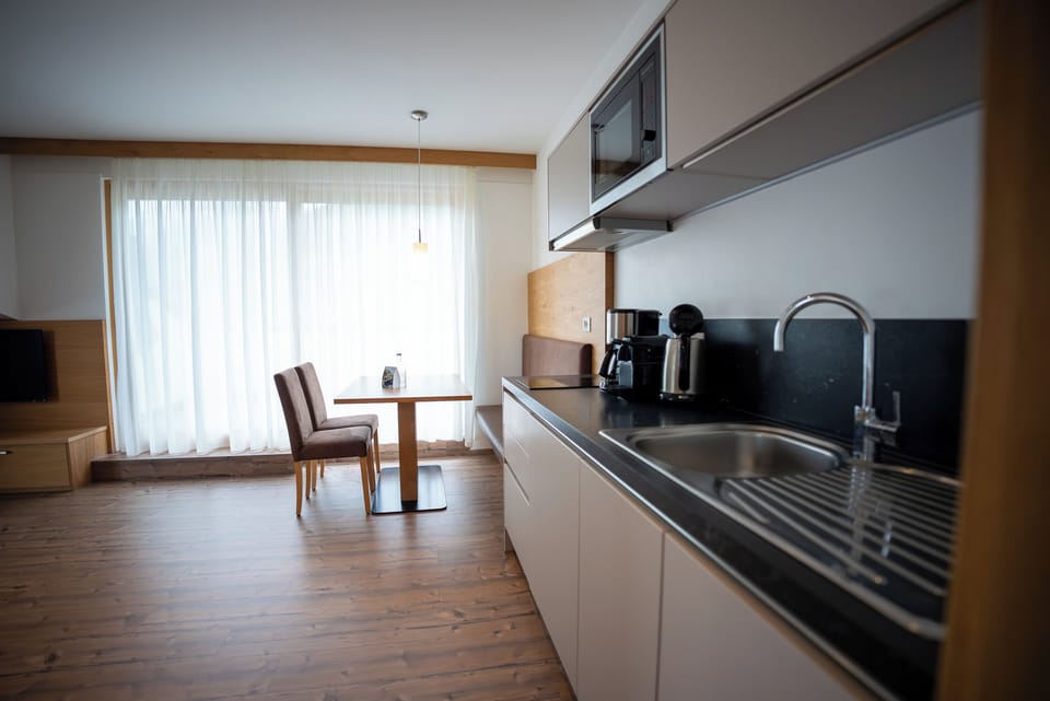 Exclusive Apartment, 1 Bedroom | Private kitchen | Fridge, microwave, stovetop, dishwasher