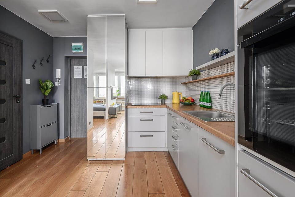Classic Apartment, Courtyard View | Private kitchen | Electric kettle, highchair