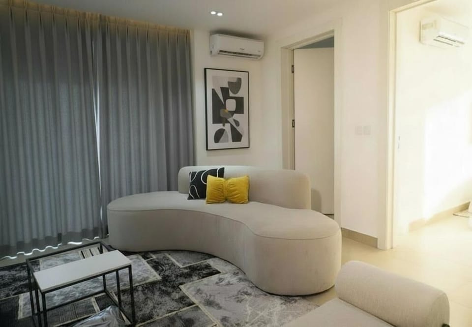 Economy Apartment, Balcony, City View | Living area | Flat-screen TV
