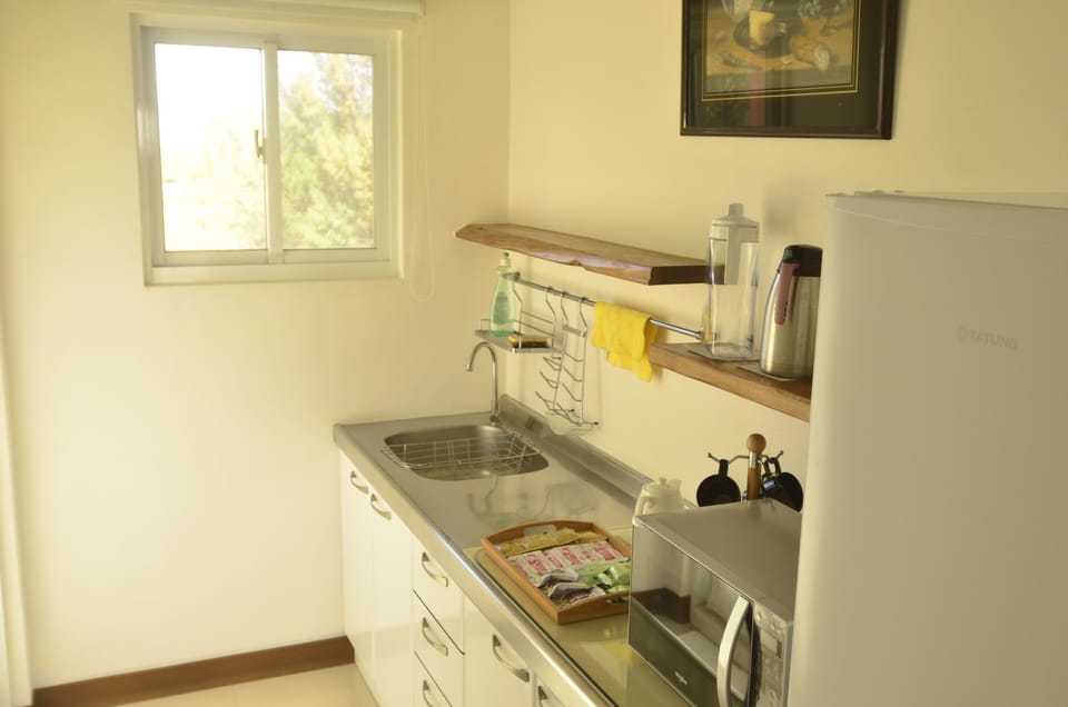 Luxury Family Room, 2 Bedrooms, Living room , Ocean View (1 double bed and 2 Japanese futons) | Private kitchen | Fridge, microwave, coffee/tea maker, electric kettle