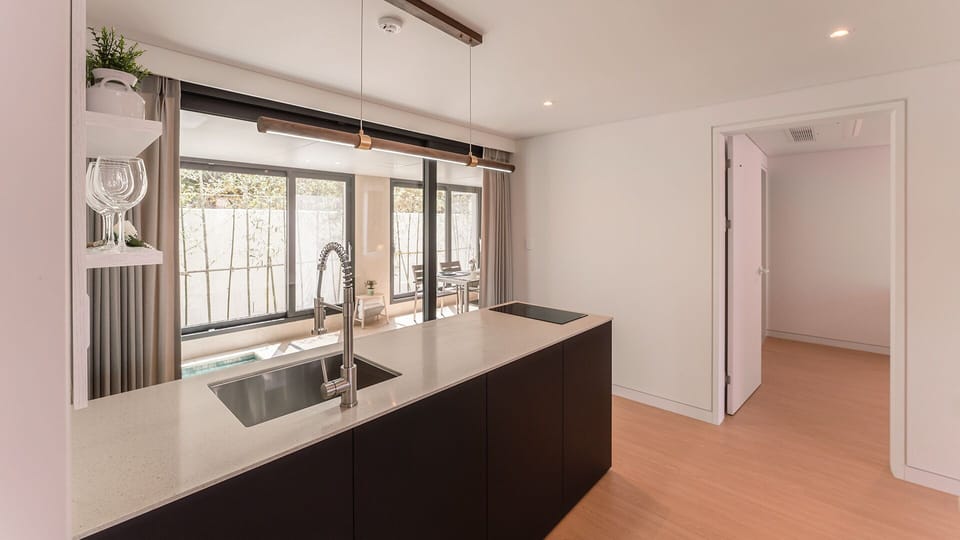 Suite 101 | Private kitchen | Fridge, microwave, stovetop, electric kettle