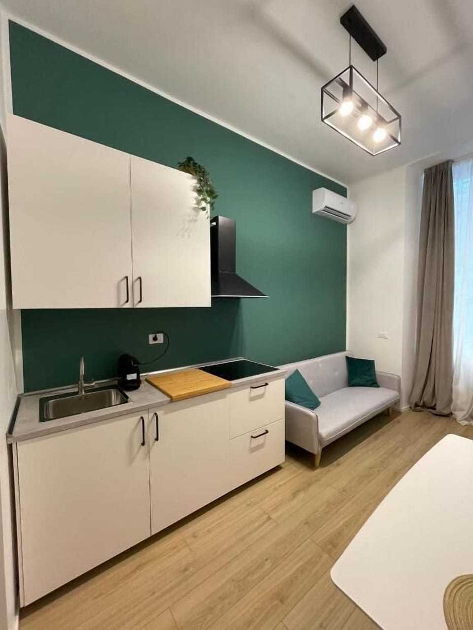 Deluxe Apartment | Living area | TV