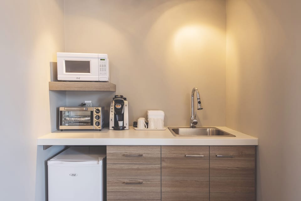 Fridge, microwave, stovetop, coffee/tea maker