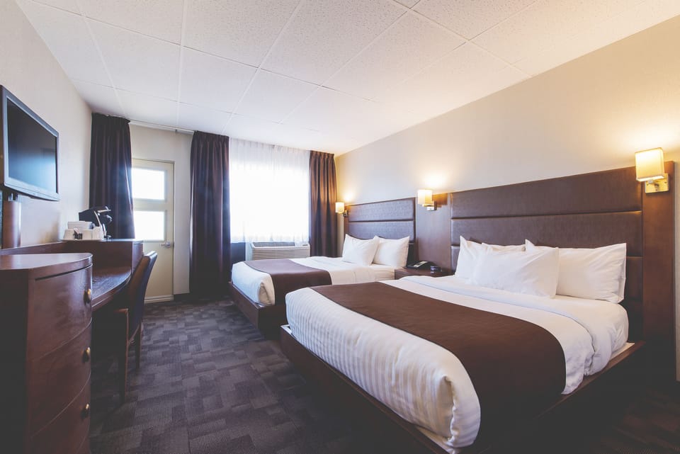 Superior Room, 2 Queen Beds | Desk, soundproofing, iron/ironing board, free cribs/infant beds