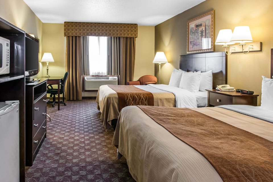 Desk, iron/ironing board, free cribs/infant beds, rollaway beds