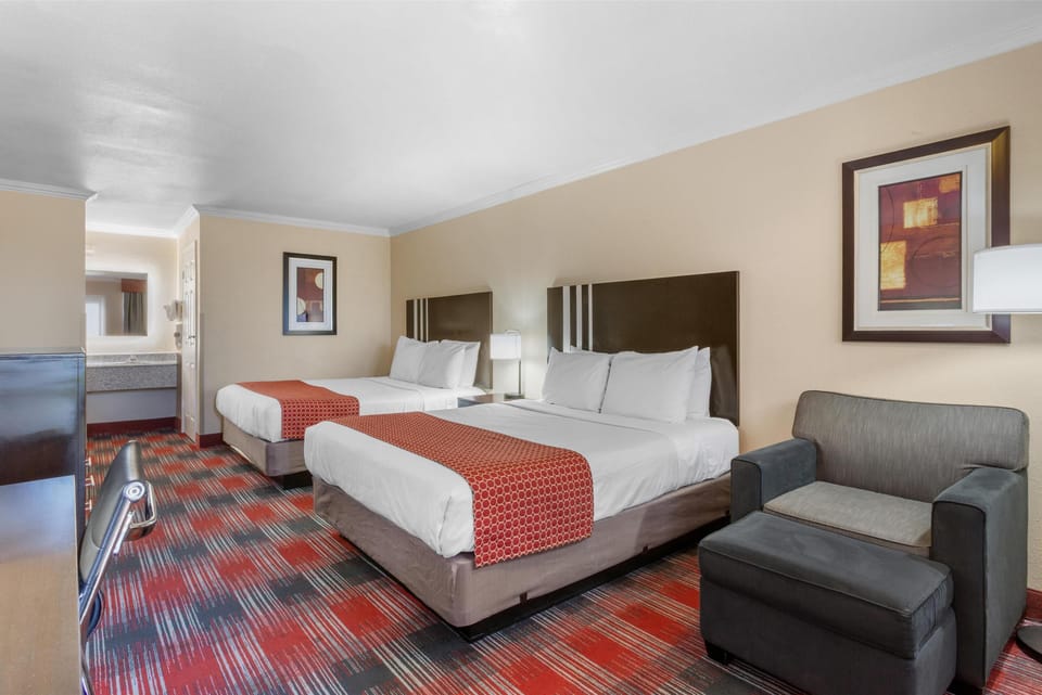 Standard Room, 2 Queen Beds, Non Smoking, Refrigerator & Microwave (Walk-in Shower) | Pillowtop beds, desk, laptop workspace, iron/ironing board