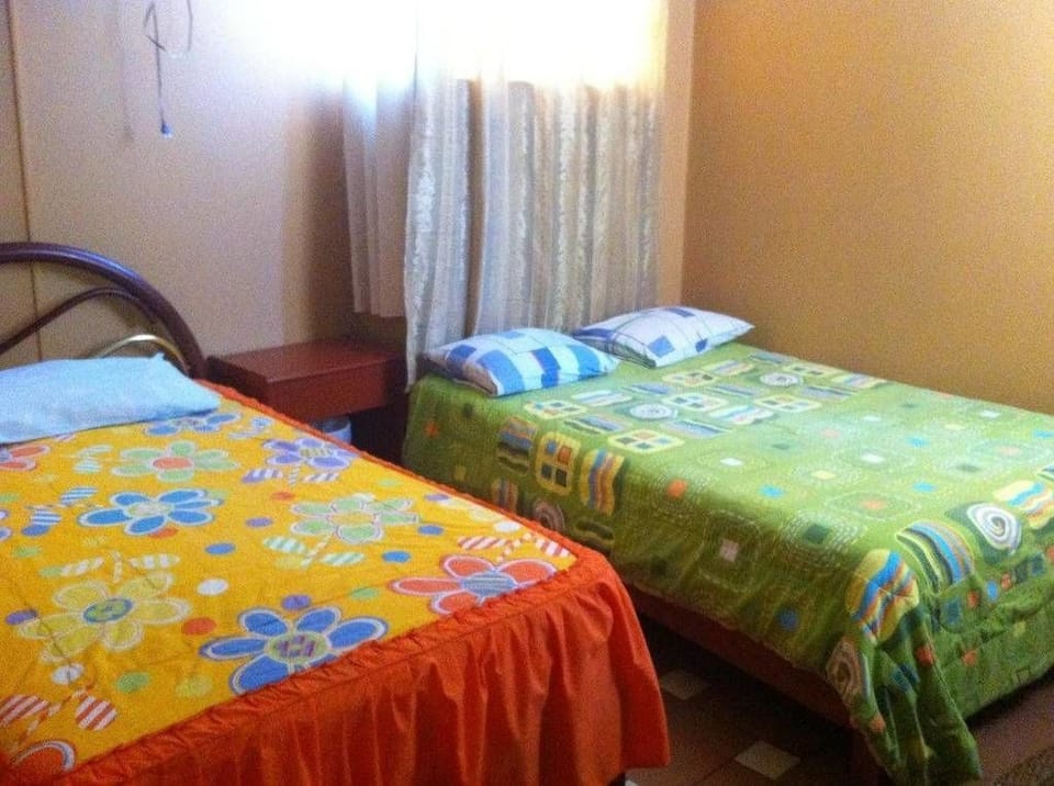 Twin Room, Shared Bathroom | In-room safe, free WiFi