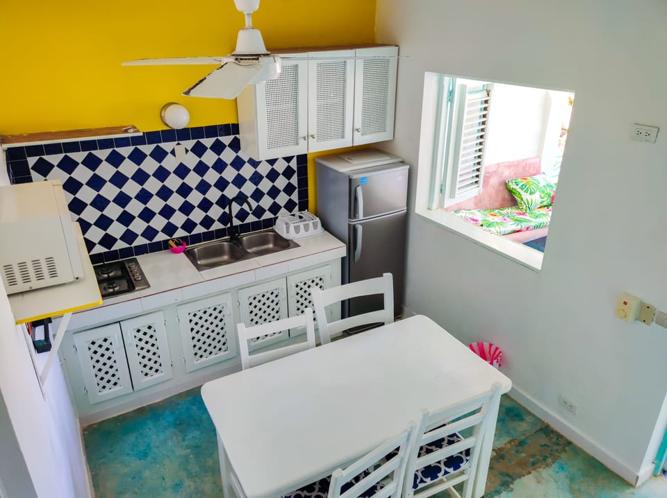 Family House | Private kitchen | Fridge, microwave, stovetop, cookware/dishes/utensils