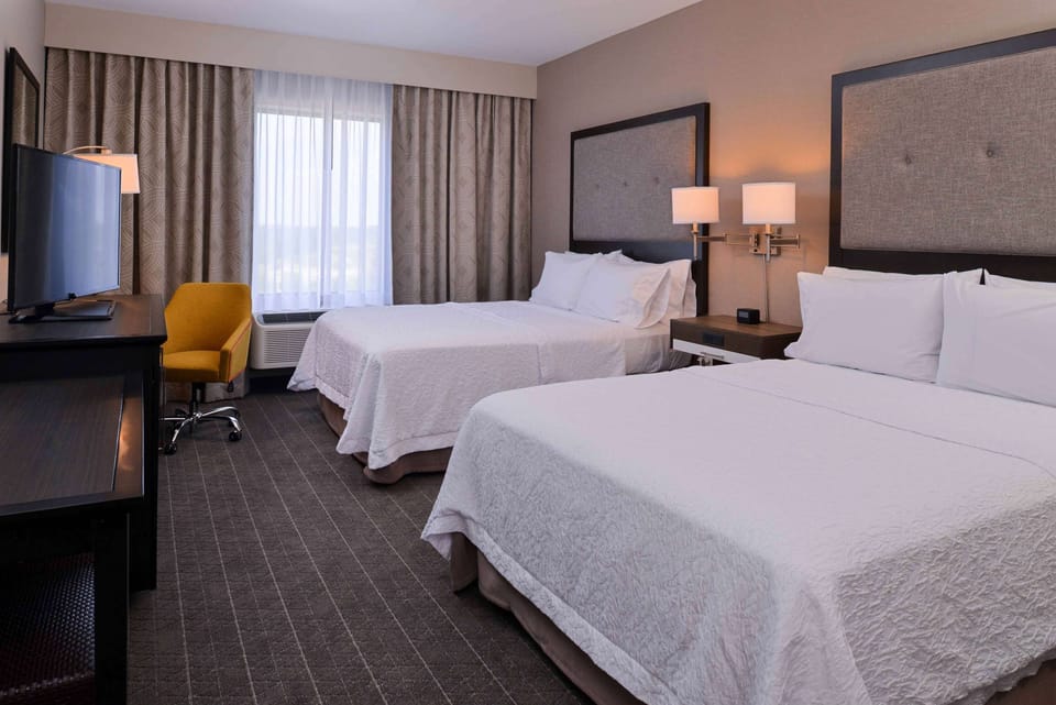 Premium bedding, desk, blackout drapes, iron/ironing board