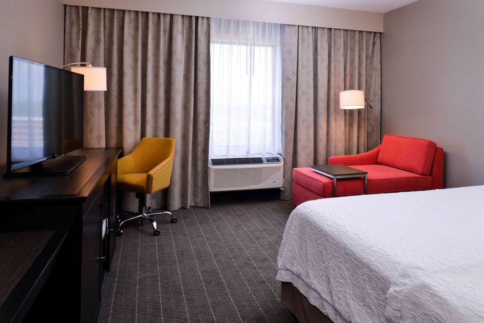 Premium bedding, desk, blackout drapes, iron/ironing board