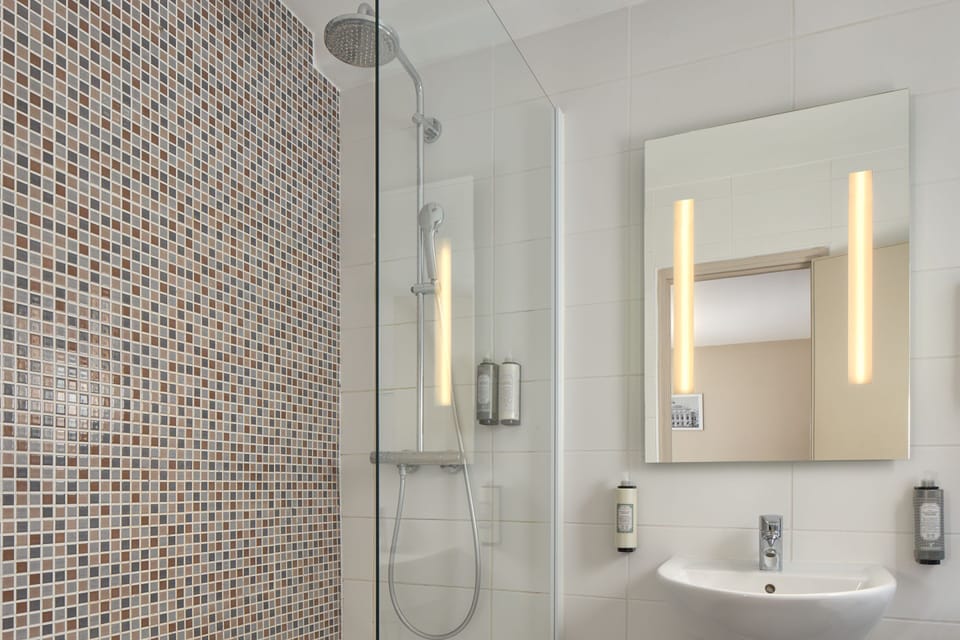 Eco-friendly toiletries, hair dryer, towels