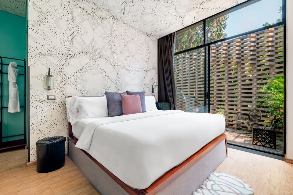 Deluxe Room, 1 King Bed | Premium bedding, down comforters, minibar, in-room safe