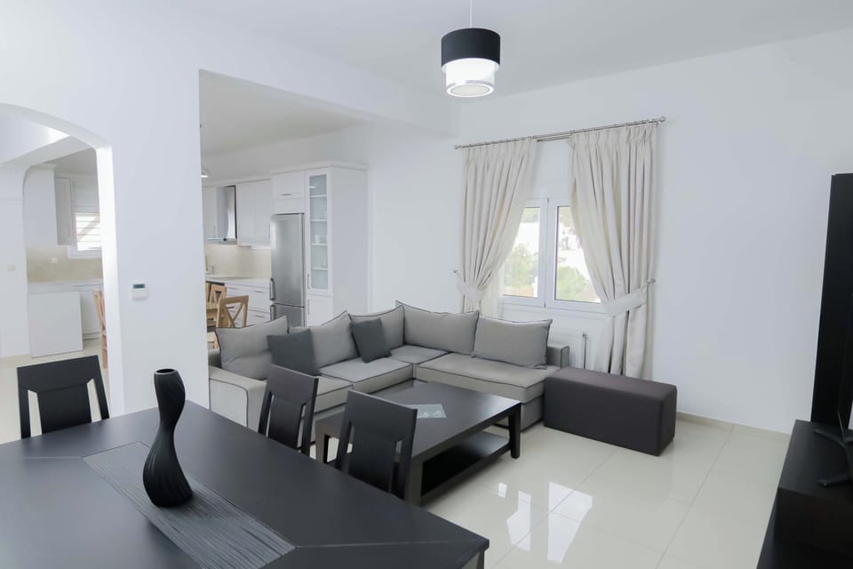 Villa, Bay View | Living area | 55-inch Smart TV with cable channels