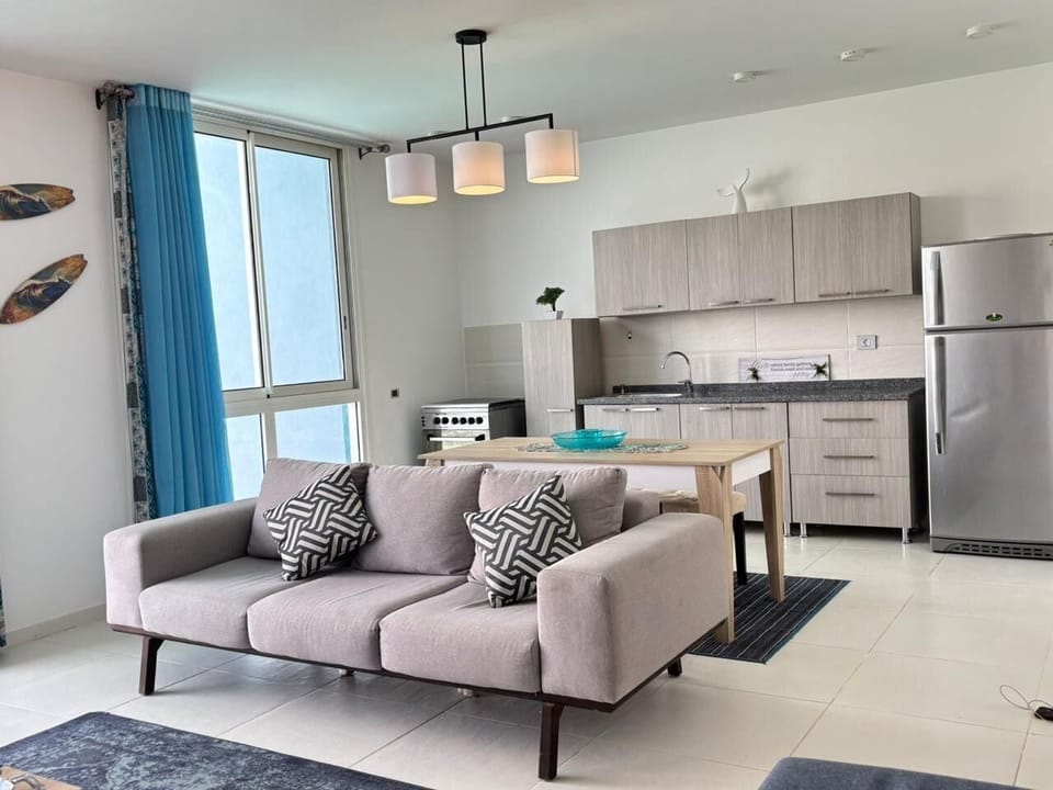 Chalet, 2 Bedrooms, Lagoon View | Living area | Flat-screen TV
