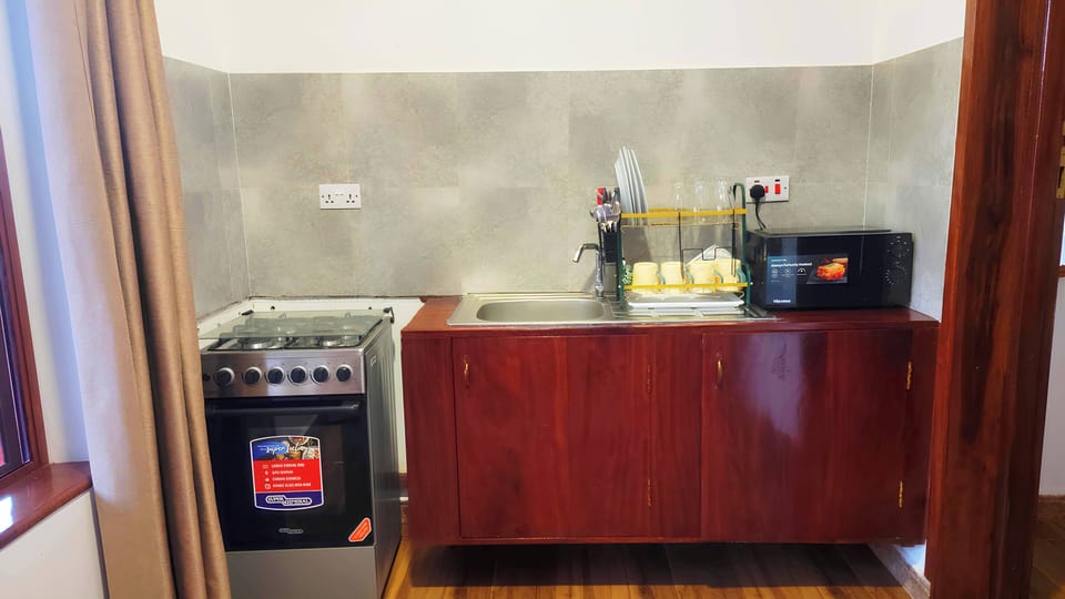 Apartment, Balcony, Pool View | Microwave