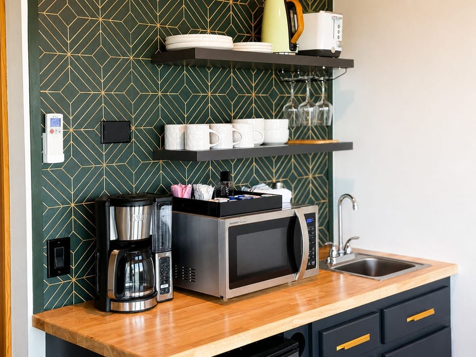 Luxury Studio Suite, River View | Private kitchenette | Coffee/tea maker, microwave, electric kettle, toaster