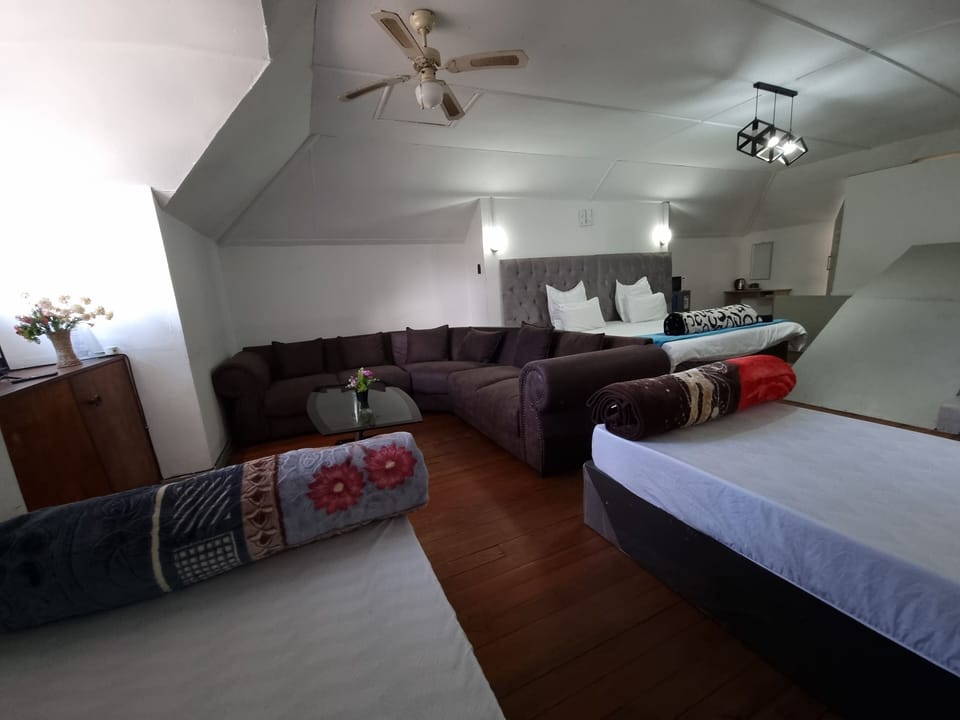 Deluxe Quadruple Room, Courtyard View | Desk, laptop workspace, iron/ironing board, free WiFi