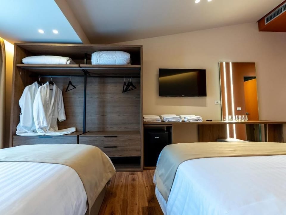 Comfort Triple Room, Balcony, Garden View | In-room safe, desk, soundproofing, free WiFi