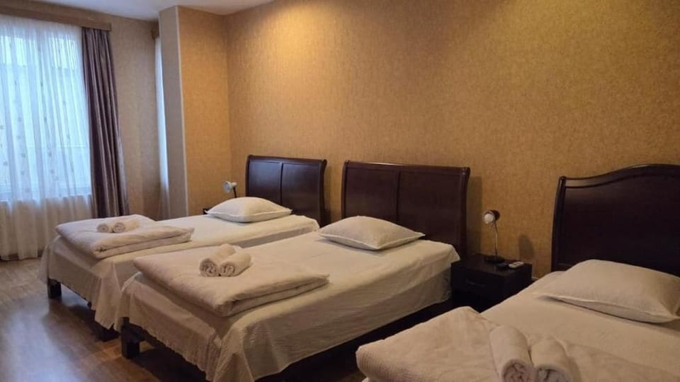 Deluxe Triple Room | In-room safe, free WiFi