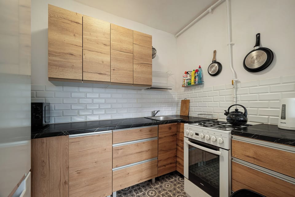 Apartment, Balcony | Private kitchen | Coffee/tea maker, electric kettle