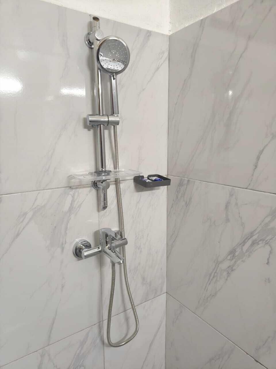 Shower, towels, soap, shampoo