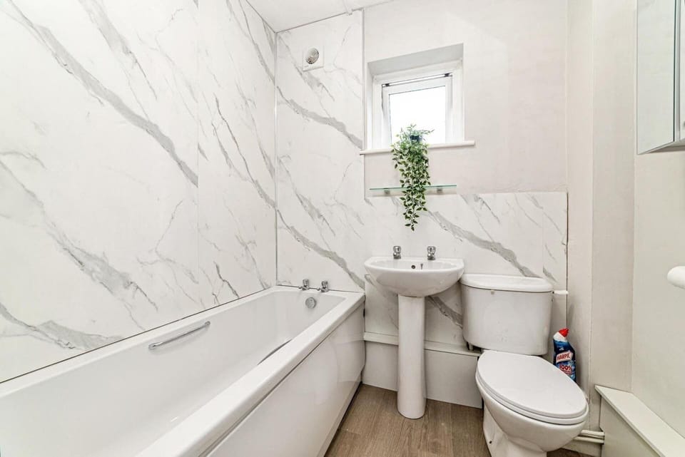 Combined shower/tub, deep soaking tub